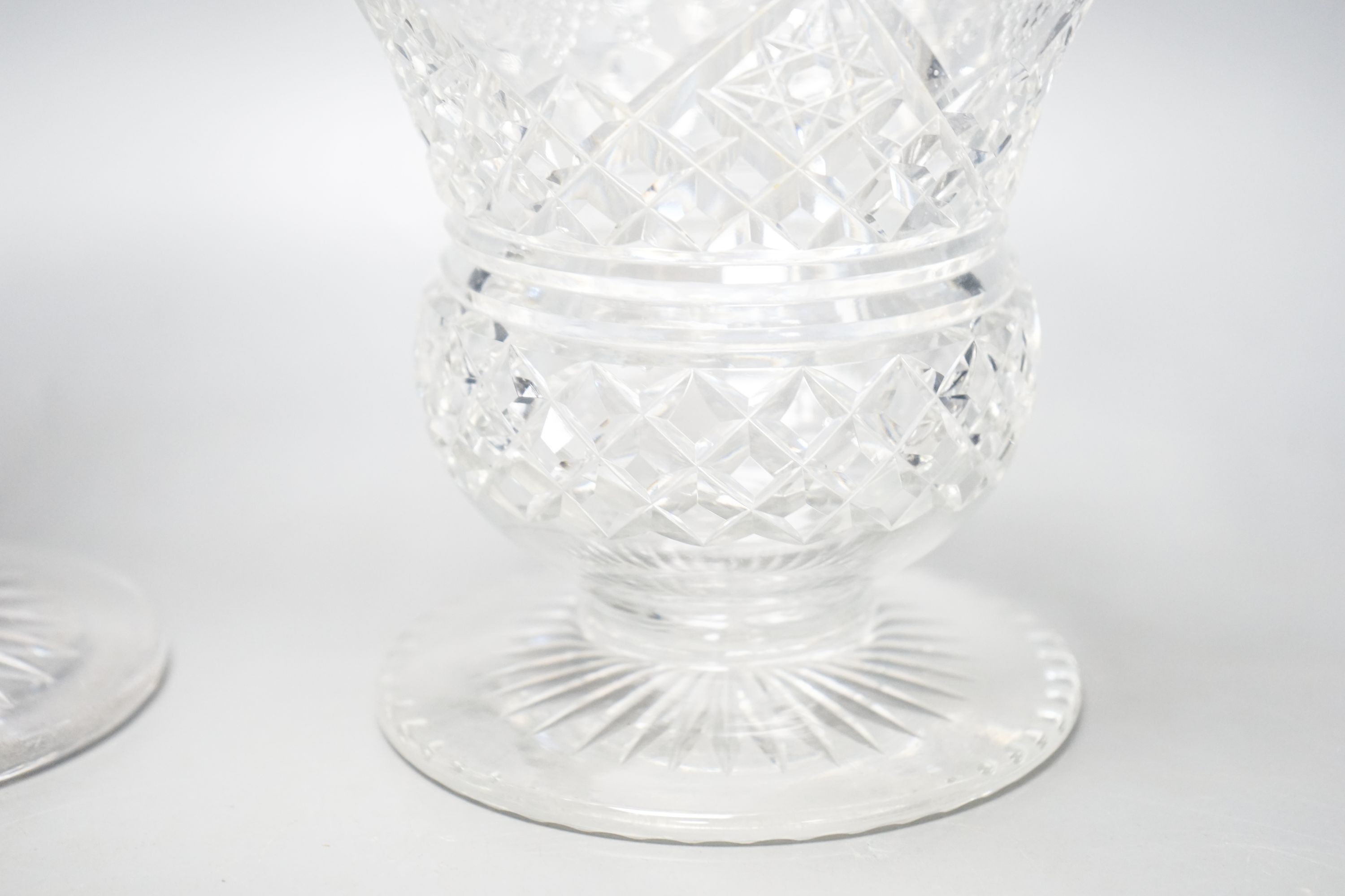 Three early 20th century cut and engraved glass vases 25cm